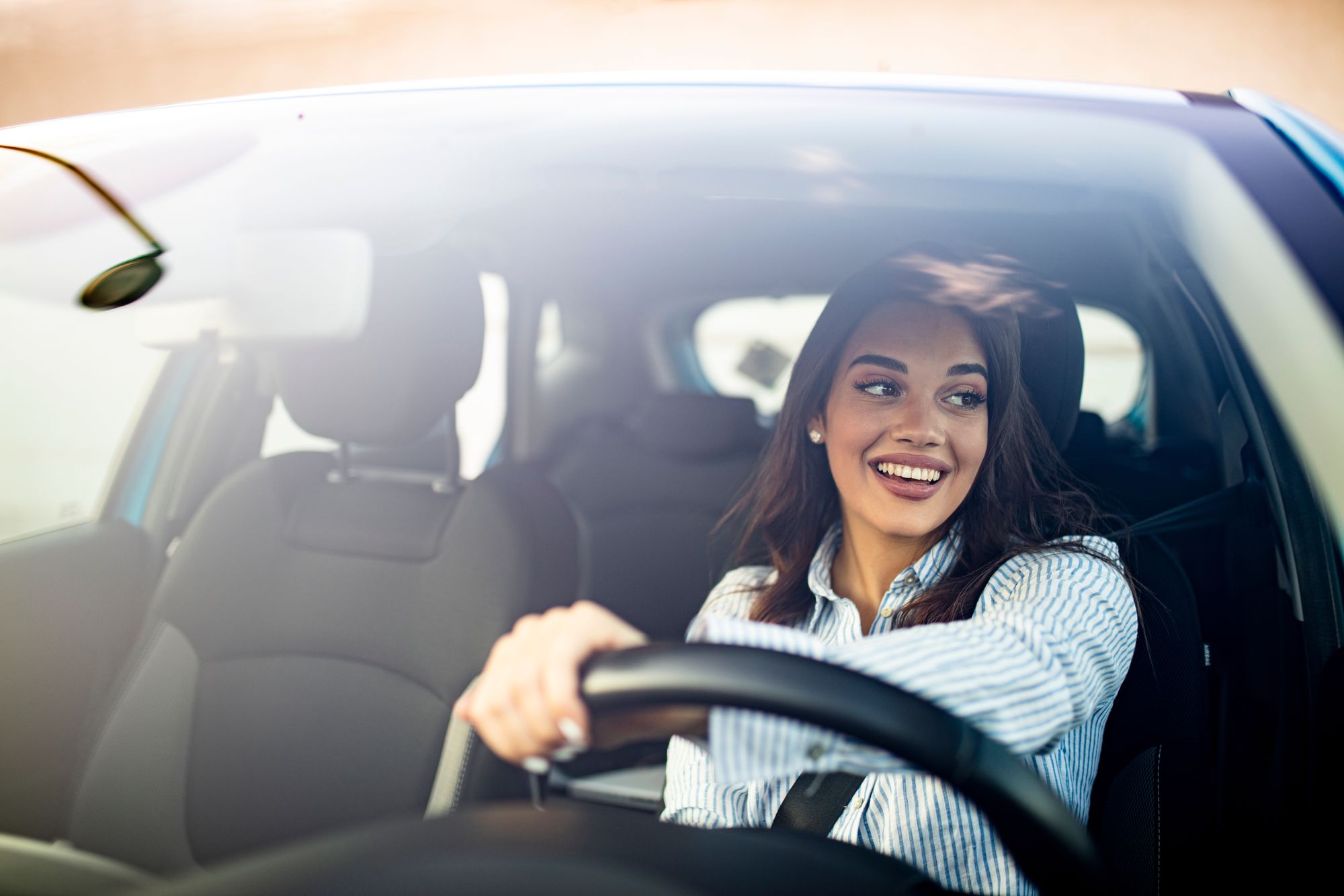 Girl driving new car